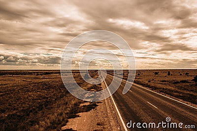 straight road in nullarbor dessert, Outback Stock Photo