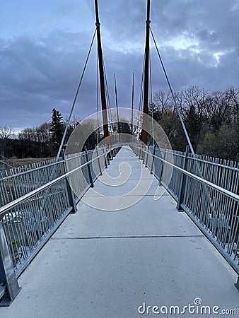 Straight walking bridge path Stock Photo