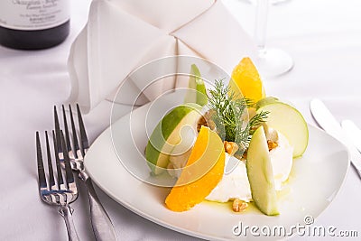 Strained Yogurt Labneh Citrus Salad Garnished with Dill and Walnuts served with oil Stock Photo