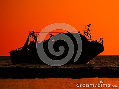 Stranded fishing boat Stock Photo