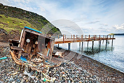 Stranded fishing boat wreck Stock Photo