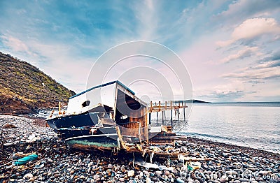 Stranded fishing boat wreck Stock Photo