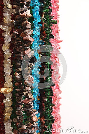 Strands of Natural Stone and Glass Beads For Sale at Craft Supply Store Stock Photo