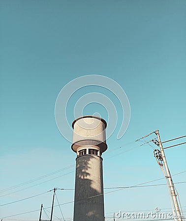 The strange building like a tower full of near cables Stock Photo