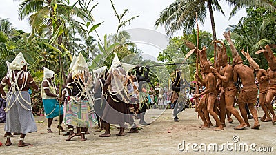 Strange dance ceremony with mud people, dancers Solomon Islands Editorial Stock Photo