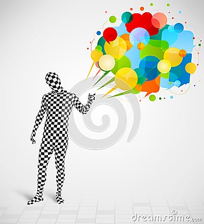 Strange guy in morphsuit looking at colorful speech bubbles Stock Photo