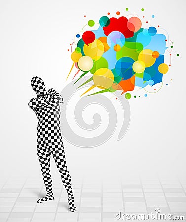 Strange guy in morphsuit looking at colorful speech bubbles Stock Photo