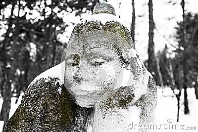 Strange sculpture in park with snow Stock Photo