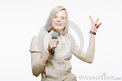 Strange slim blonde girl sing karaoke Stock Photo