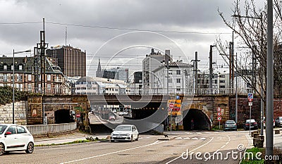 Strasbourg in Alsace. Urbanism. Interweaving of wires, trains, buildings, cars, roads Editorial Stock Photo