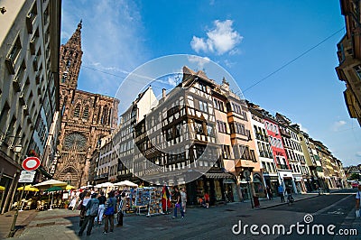 Strasbourg cathedral with Bollinger shop Editorial Stock Photo