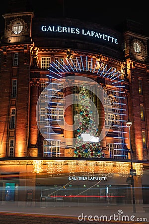 Strasbourg downtown at night during Christmas market, France, vertical Editorial Stock Photo