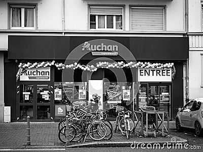 Auchan Supermarket entrance in French neighborhood on a winter s Editorial Stock Photo