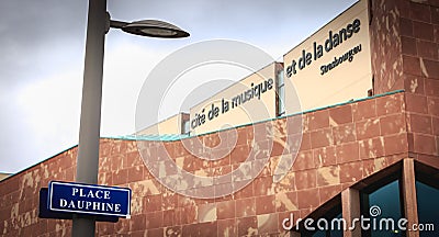 Blue street sign where it is written in French Dauphine Square Editorial Stock Photo