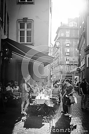 People terrace 6 Rue du Vieux Seigle eating at L`Epicerie Editorial Stock Photo