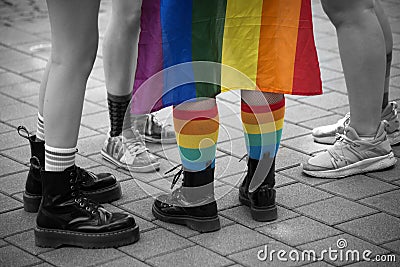 Young woman wearing a rainbow angel wings during the gay pride Editorial Stock Photo
