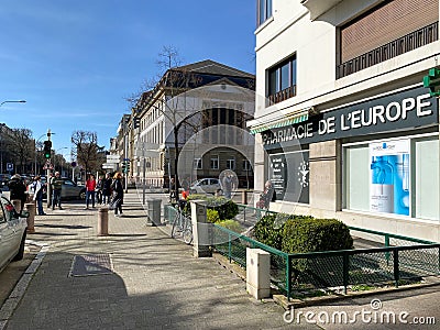 People waiting in queue to enter the Pharmacy Drug store pharmacie de l`europe Editorial Stock Photo