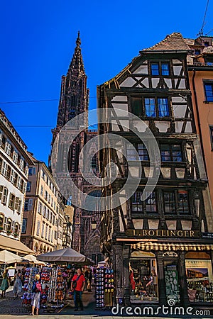 Notre Dame Cathedral and traditional half timbered houses in Strasbourg, France Editorial Stock Photo