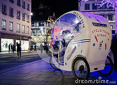 Rickshaw in europe at night Editorial Stock Photo