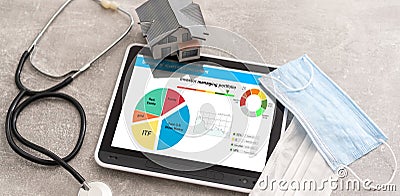 Strategy of diversified investment. Investor managing portfolio. Pie chart and candlestick charts. Stock Photo