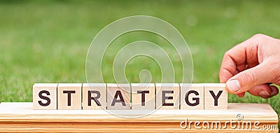 STRATEGY is a word written on wooden blocks, concept Stock Photo