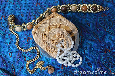 Straw box for jewelry with beads Stock Photo