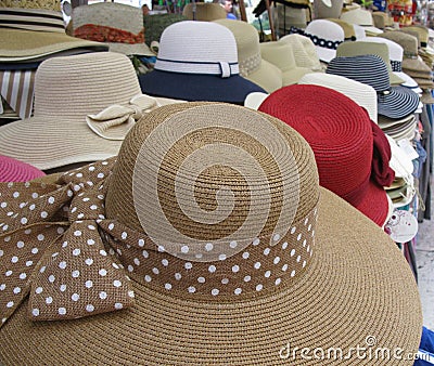 A straw Fashion hat with studs on the ribbon Stock Photo