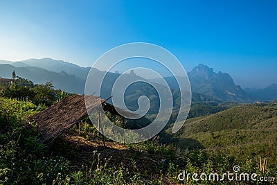 Straw shelter at mountain at Phou Khoun Stock Photo