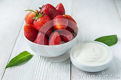 Strawberries with cream Stock Photo