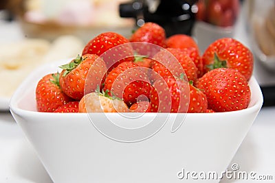 Strawberries. Fresh red strawberries in a white bowl. Stock Photo