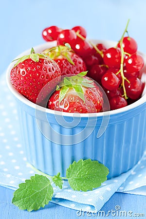 Strawberries and redcurrants Stock Photo