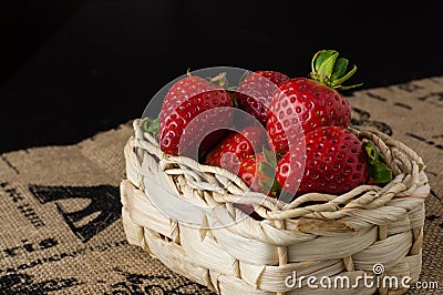 Strawberries in a small basket Stock Photo