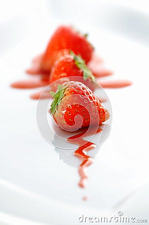 Strawberries on white dish Stock Photo