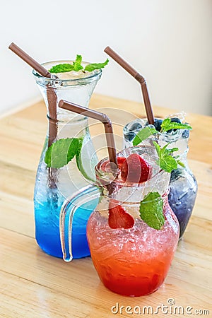 Strawberry , blue Hawaii , and blueberry italian soda Stock Photo