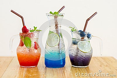 Strawberry , blue Hawaii , and blueberry italian soda Stock Photo