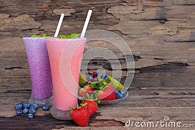 Strawberry and blueberry smoothies colorful fruit juice,beverage healthy the taste yummy In glass drink food for breakfast and sna Stock Photo