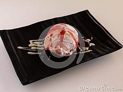 Strawberry cheese cake ice cream with white chocolate Stock Photo