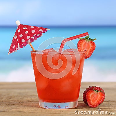 Strawberry cocktail drink on the beach and sea in summer Stock Photo