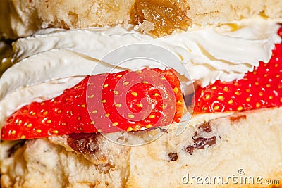 Strawberry cream scone in close up. Sweet afternoon dessert treat. Stock Photo