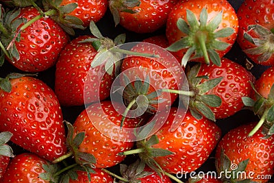 Strawberry on dark background with selective focus and crop fragment Stock Photo