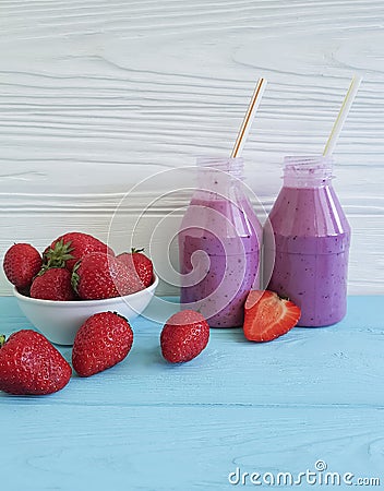 Strawberry smoothies fresh juicy taste breakfast towel summer on a pink wooden background Stock Photo