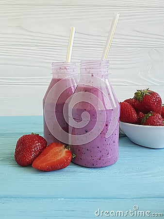 Strawberry smoothies fresh taste breakfast summer on a pink wooden background Stock Photo