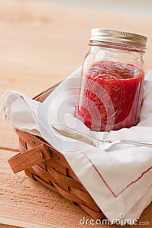 Strawberry jam in basket Stock Photo