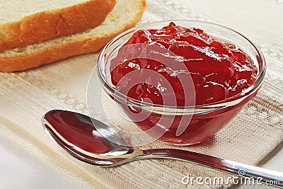 Strawberry jam in glass bowl Stock Photo