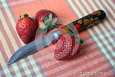 Strawberry and knife Stock Photo