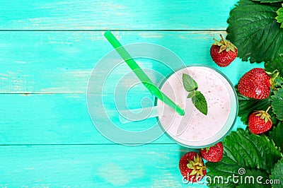 Strawberry-milkshake in a glass on a bright background Stock Photo