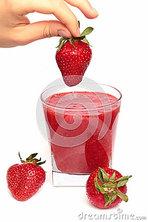 Strawberry over strawberry juice Stock Photo