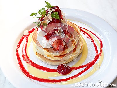 Strawberry pancake in white plate Stock Photo