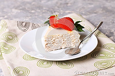 Strawberry quark cake on a white plate Stock Photo