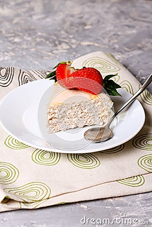 Strawberry quark cake on a white plate Stock Photo